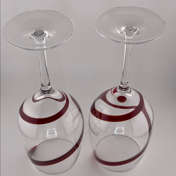 Elegant Wine Glasses with Red Swirl